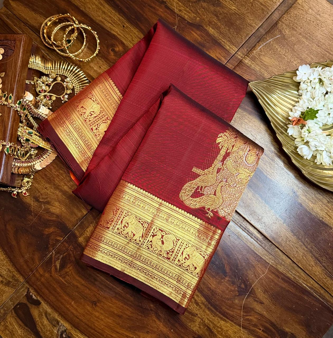 Bridal Maroon Pure Kanchipuram Silk Saree with Elephant Zari Border